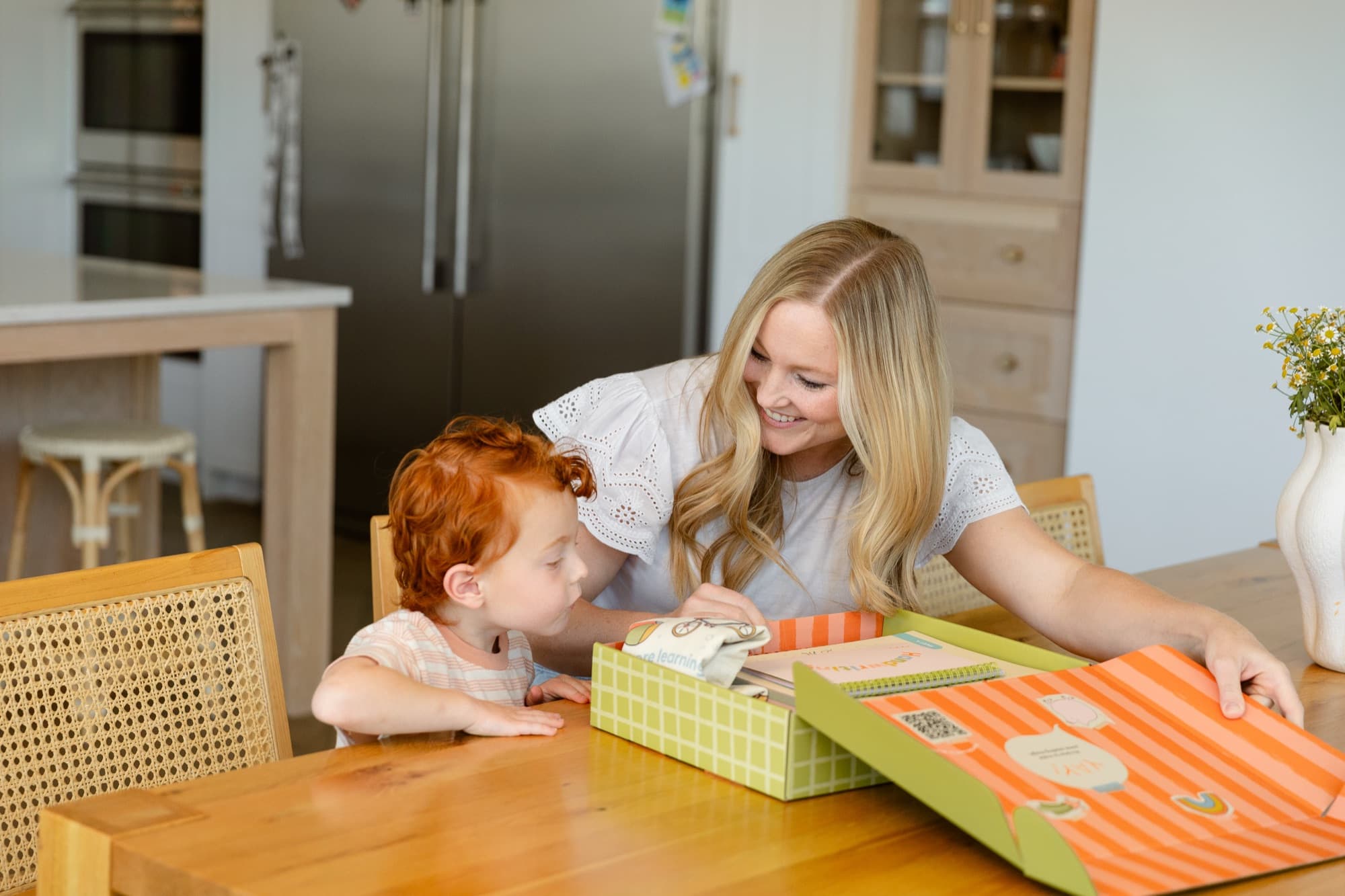 A parent and child sharing a Bright & Brilliant reading lesson