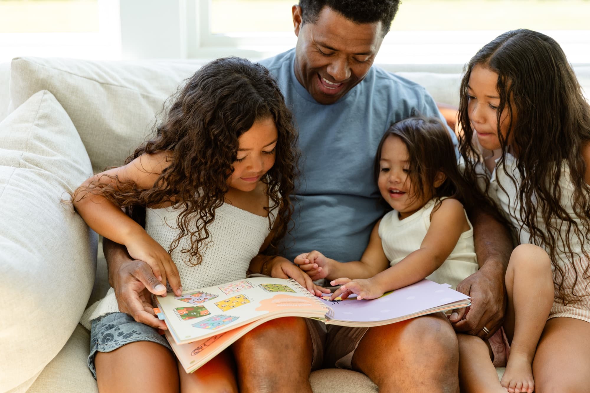 A child practicing reading with Bright & Brilliant